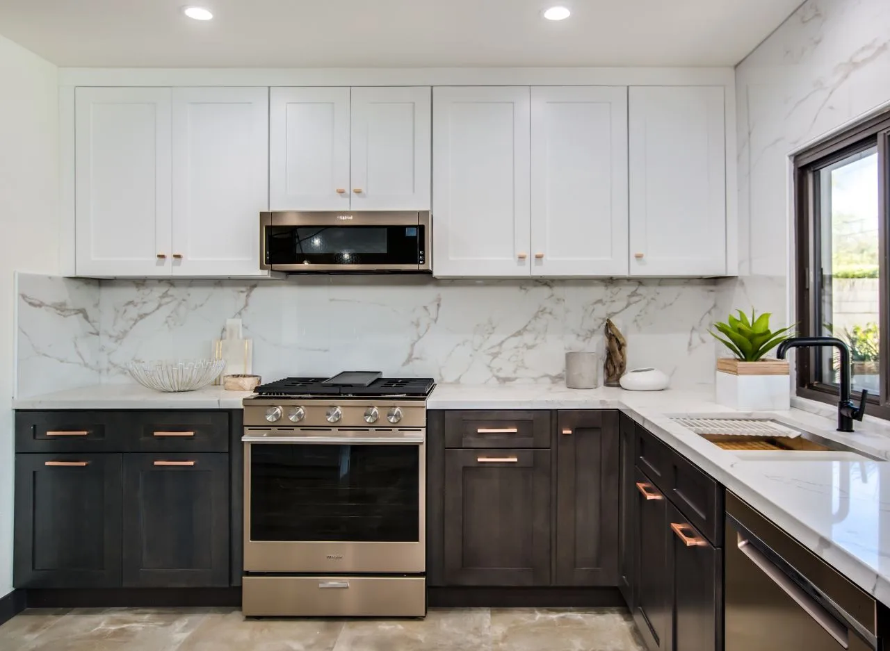 Ice White Shaker kitchen with a Greystone island